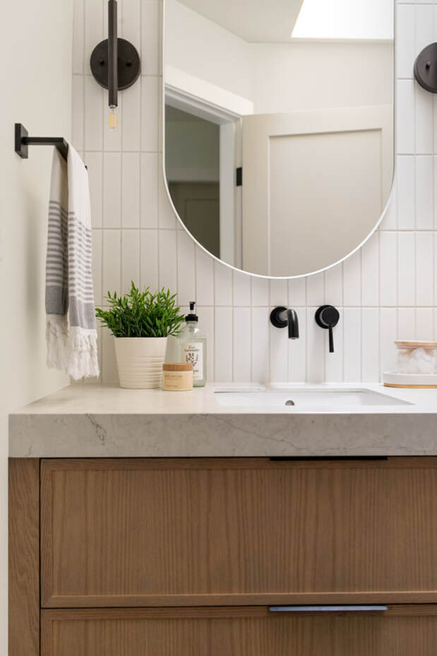 Modern Bathroom design, wood vanity, modern bathroom backsplash, wall mount faucet, Vernon BC interior design, interior designer, Alyssa Wilcox InteriorsPicture